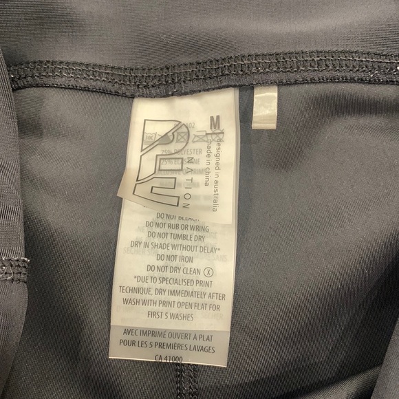 P.E Nation Touchback Black Blue Stripe Leggings - Picture 14 of 16